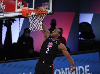 Kawhi Leonard, #2 of the LA Clippers, dunks the ball during the second quarter against the Denver Nuggets in Game One of the Western Conference Second Round during the 2020 NBA Playoffs at AdventHealth Arena at the ESPN Wide World Of Sports Complex on Sept. 3, 2020 in Lake Buena Vista, Florida.