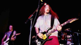 Machine Head’s Robb Flynn playing live onstage in 1994