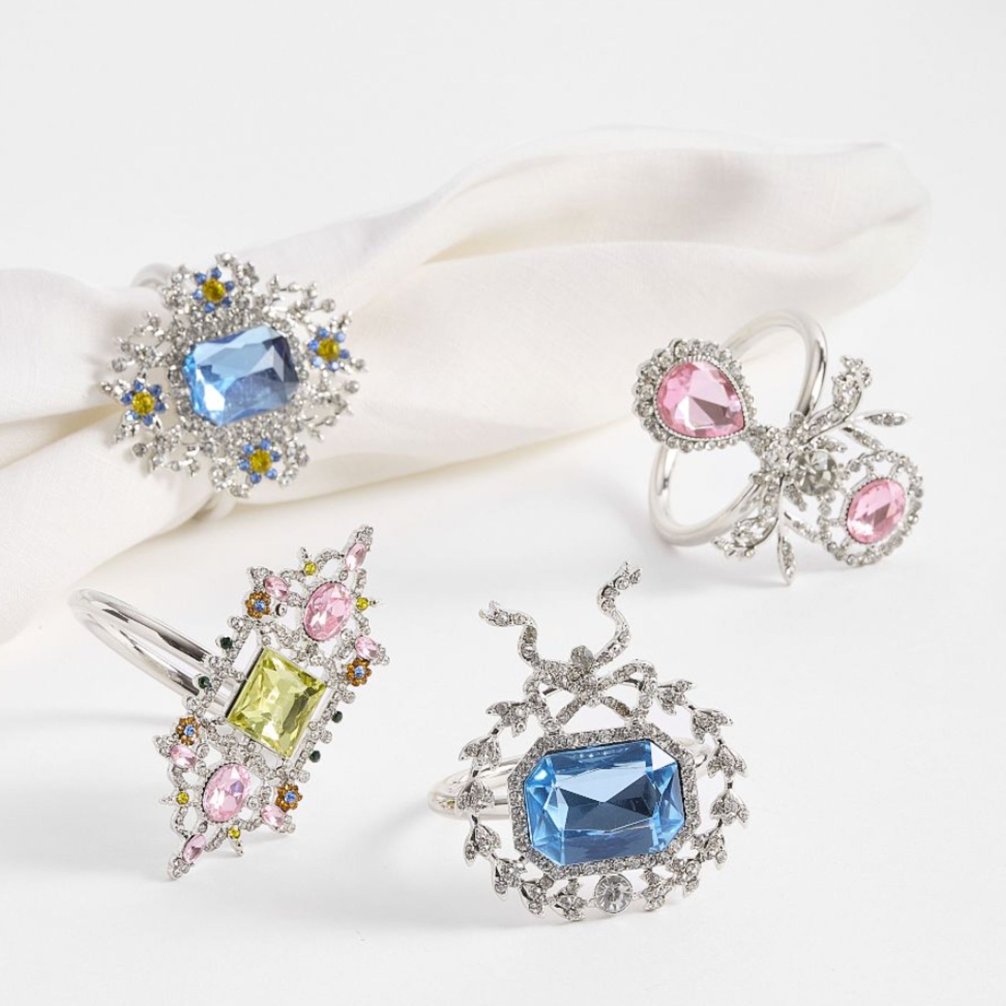 Pink, blue and yellow gemstone napkin rings