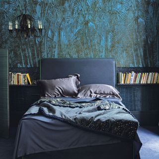 modern blue bedroom with tropical print wallpaper