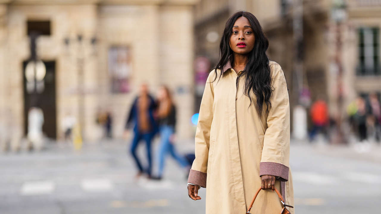 Carrole Sagba with hair in centre parting and trench coat GettyImages-1392571744