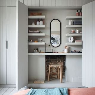 dressing table with shelves and white flooring