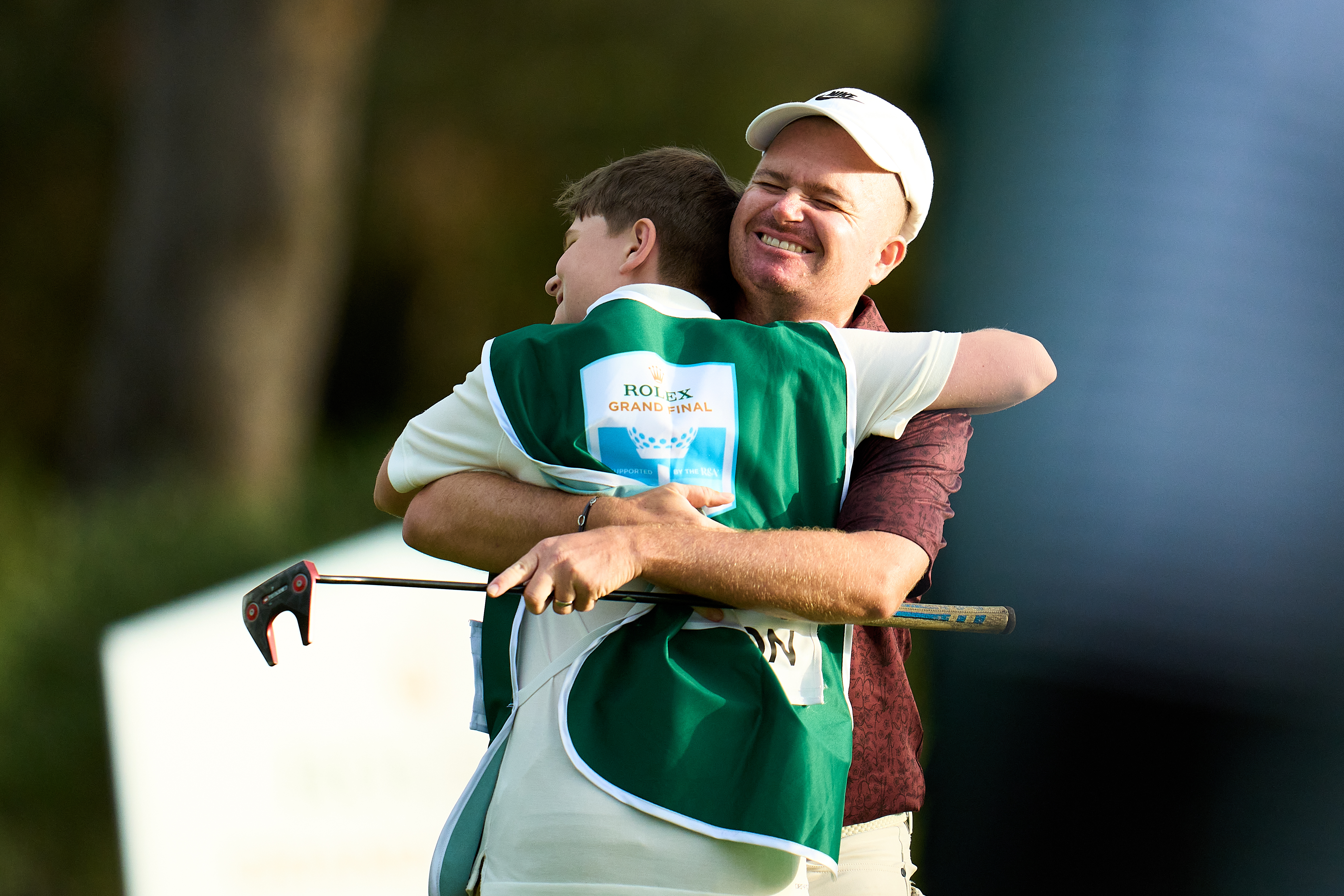James Morrison hugs his caddie