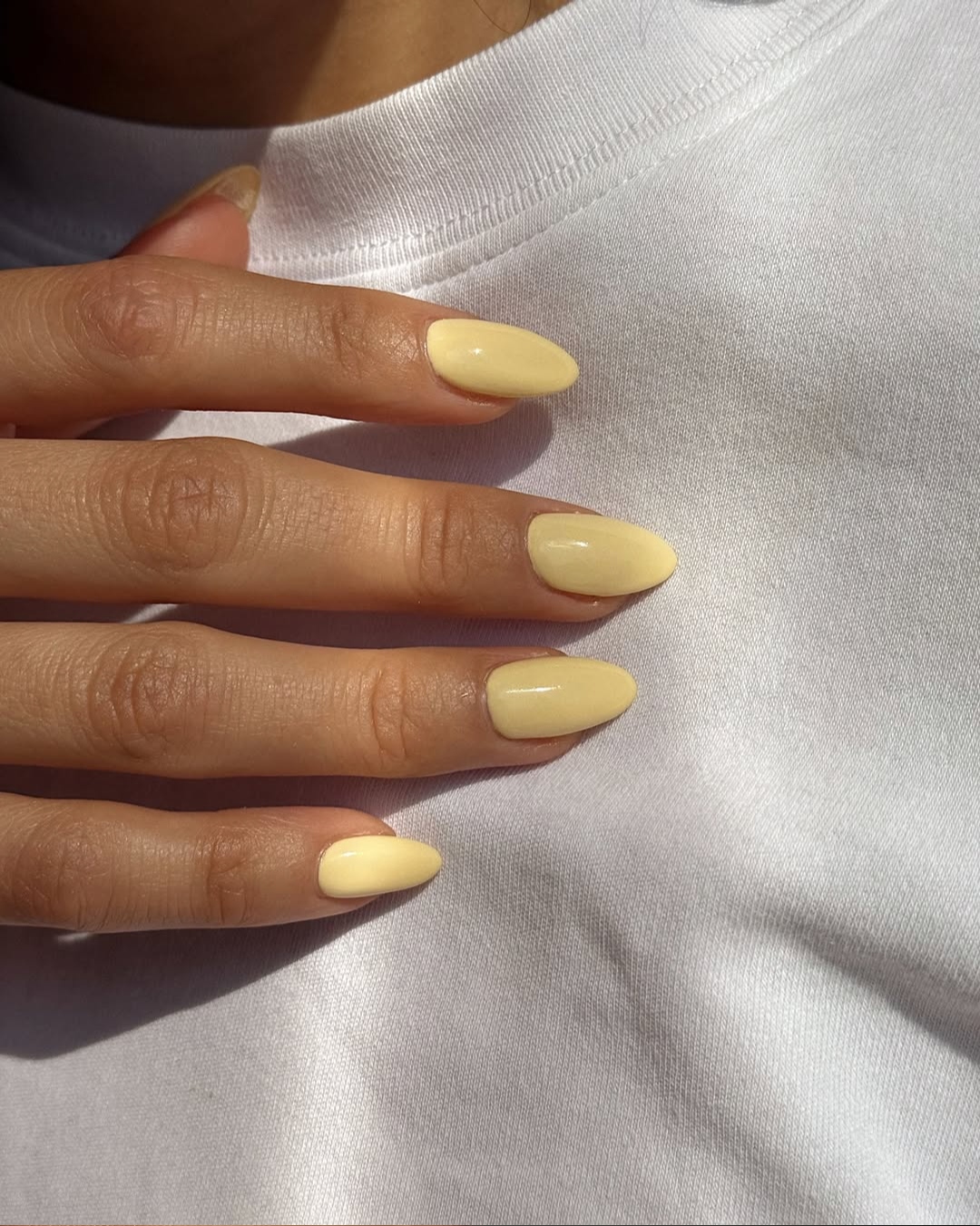 Buttercup yellow manicure by Queenie Nguyen