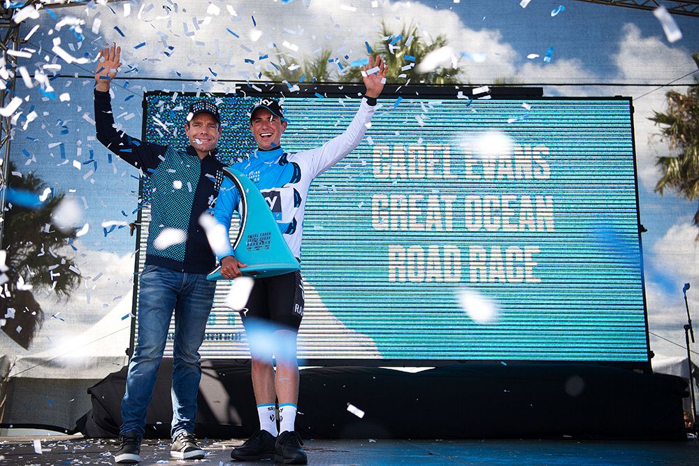 Race winner Peter Kennaugh with Cadel Evans