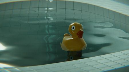 A lone rubber duck sits in a pool of water surrounded by white tiles