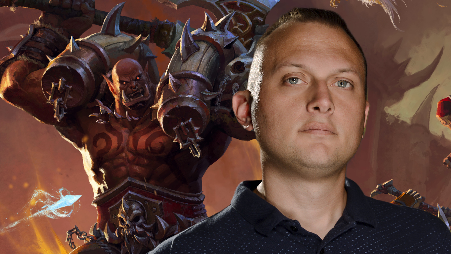 An image of game director Ion Hazzikostas in front of art for Mists of Pandaria: Remix - showing Garrosh Hellscream roaring with an axe held in hand.
