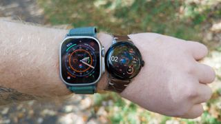 Google Pixel Watch vs. Apple Watch Ultra side-by-side on wrist