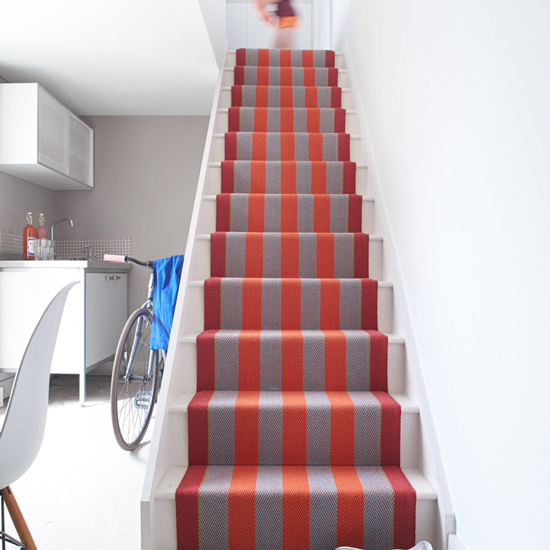 striped roger oates runner on stair