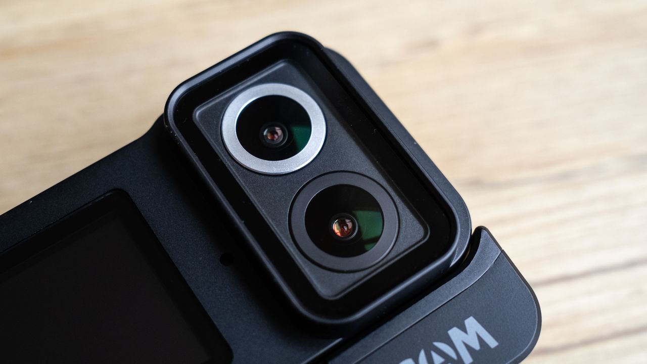 SJCAM SJ20 action camera on a wooden floor