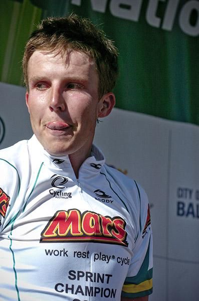Mitchell Lovelock-Fay from the Australian Capital Territory gets a taste for a MARS after winning the sprint points jersey.