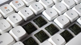 Lofree Flow mechanical wireless keyboard photograph showing Kailh Ghost low-profile linear mechanical switches
