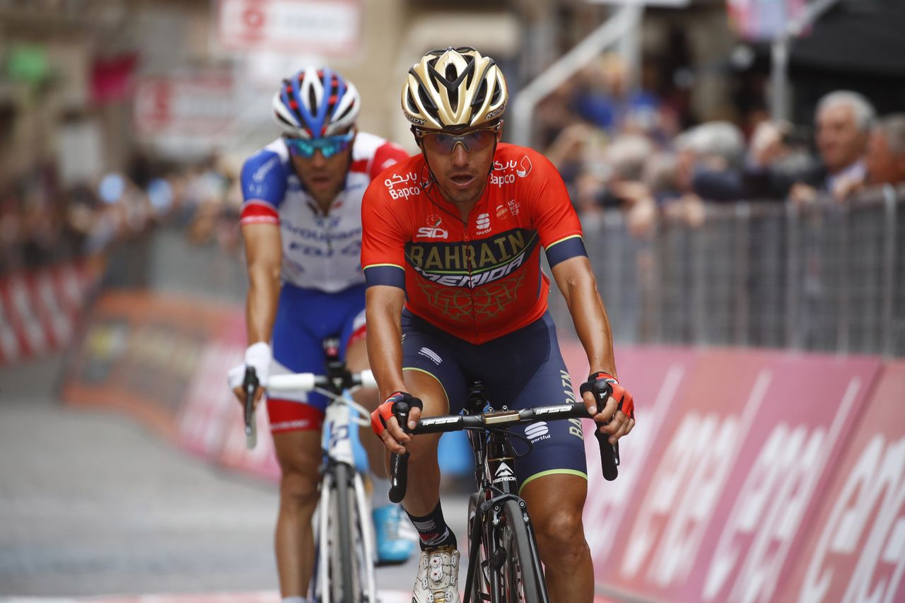 Domenico Pozzovivo crosses the line ahead of Thibaut Pinot