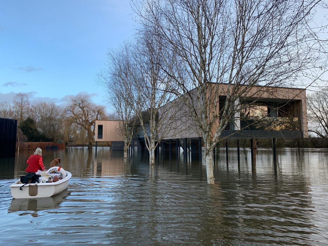 a self build home built on stilts above a flood plain