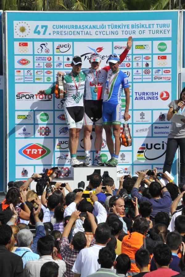 Andr&eacute; Greipel (Omega Pharma-Lotto) atop the podium.