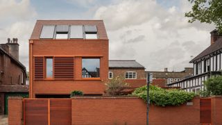 A brick built Passivhaus with front wall and gate