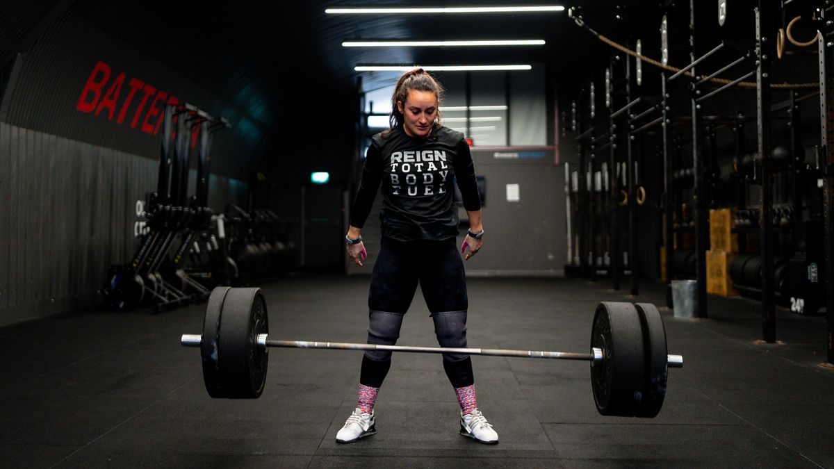 Sarah Davies dropping a barbell