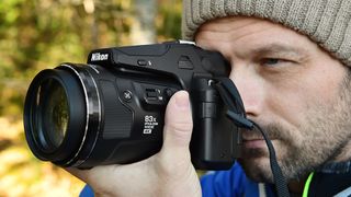 Nikon Coolpix P950 being used by a photographer