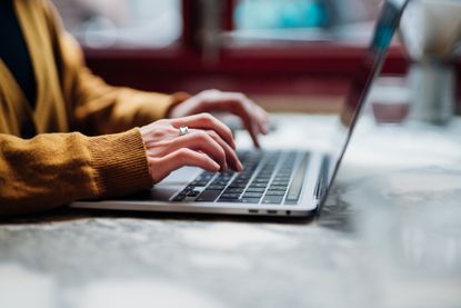 Woman researching financial support measures