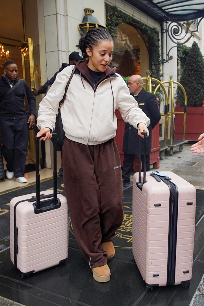 Chase Infiniti wearing a brown sweatsuit, beige jacket, and tan Ugg boots