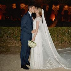 a photo of charles and georgie kissing.