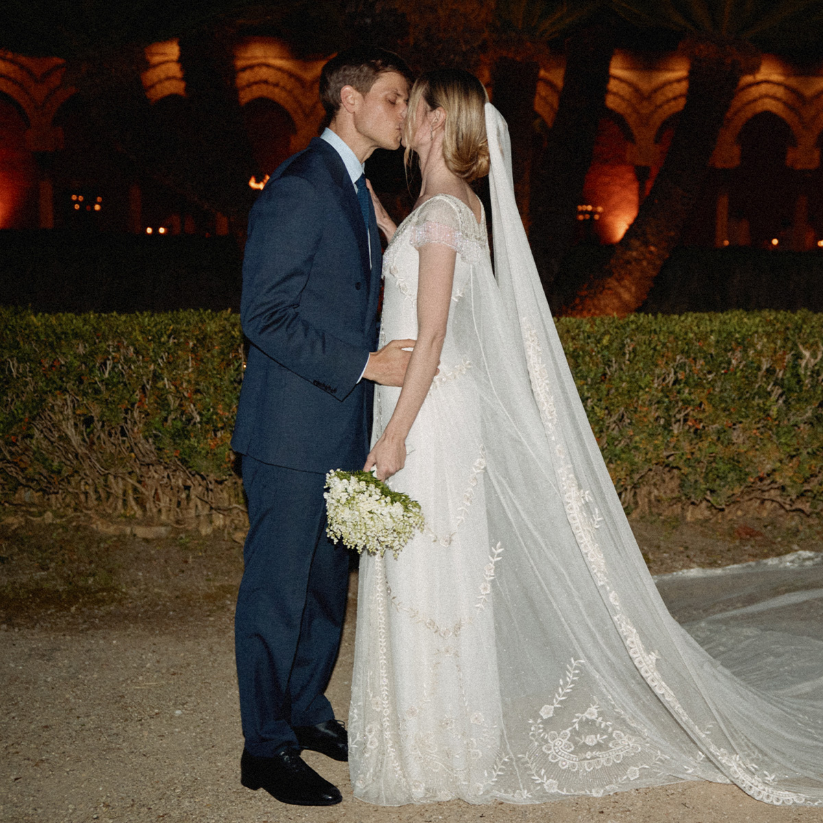 a photo of charles and georgie kissing.
