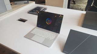 light silver laptop on table