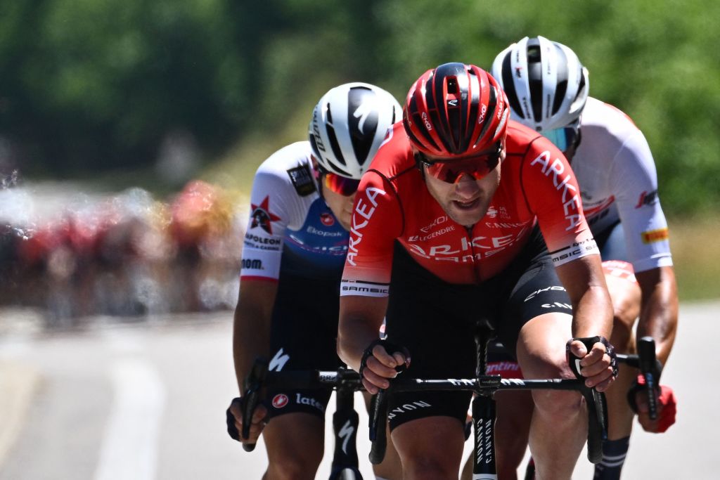 Team ArkeaSamsic teams Polish rider Lukasz Owsian C QuickStep Alpha Vinyl teams italian rider Andrea Bagioli L and TrekSegafredo teams Belgian rider Jasper Stuyven R cycle in a breakaway during the sixth stage of the 74th edition of the Criterium du Dauphine cycling race 1965 km between Rives and Gap central eastern France on June 9 2022 Photo by Marco BERTORELLO AFP Photo by MARCO BERTORELLOAFP via Getty Images