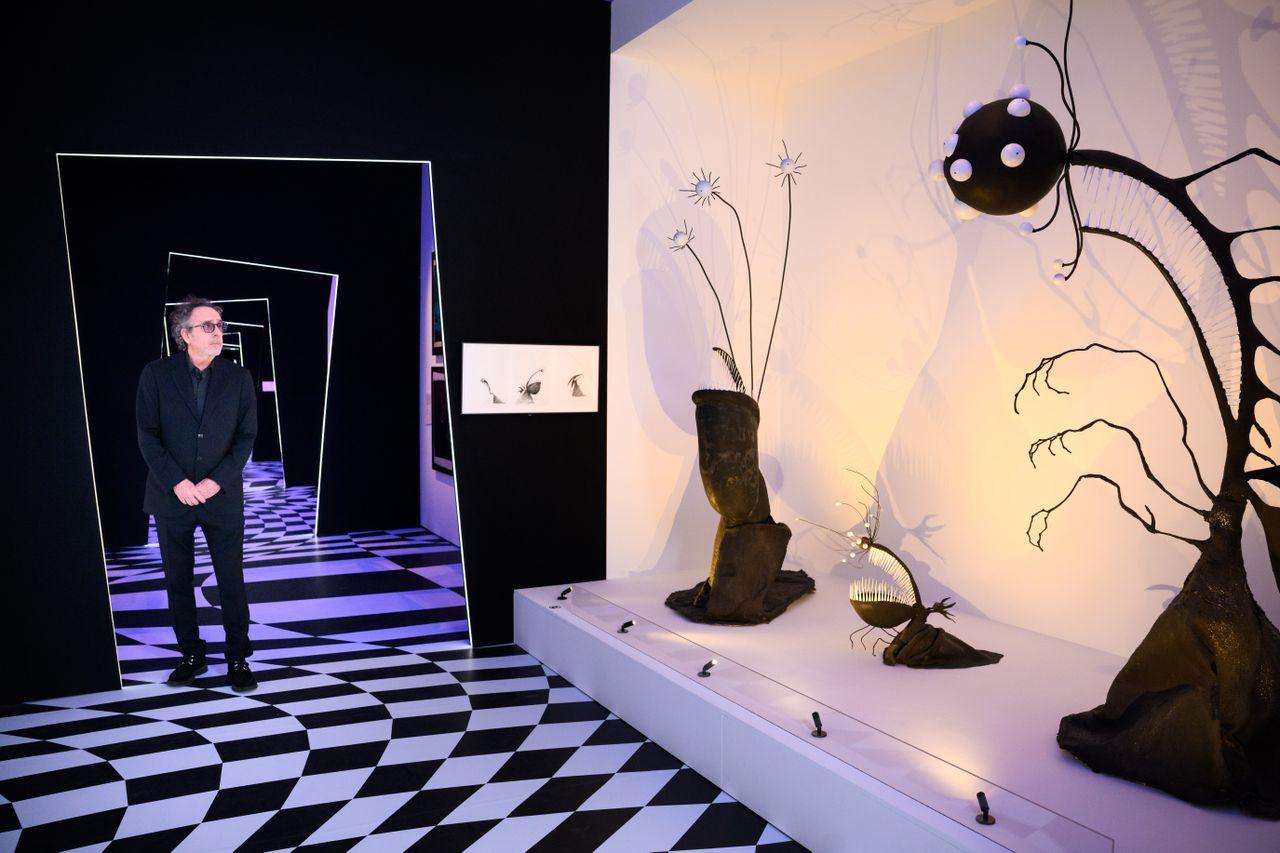The World of Tim Burton's installation view, featuring Tim Burton himself.