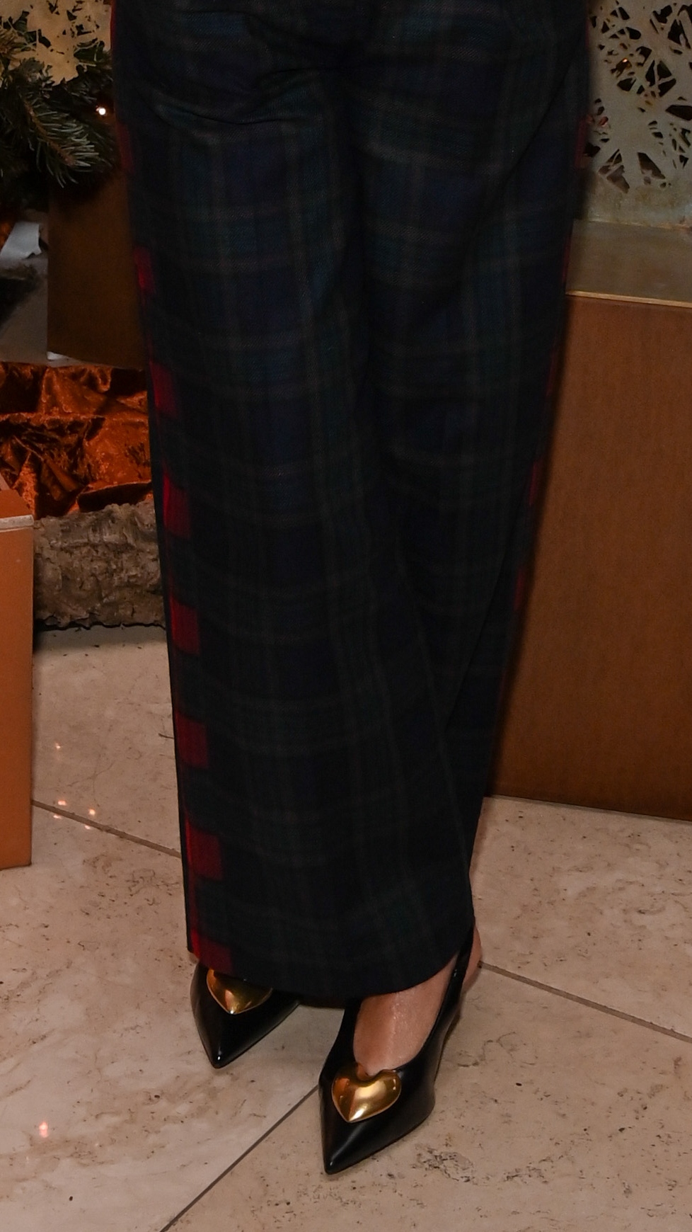 A close-up of Alex Jones&#039; shoes at the annual 45 Park Lane Christmas Tree Switch On on November 19, 2025