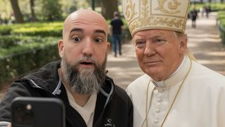 An AI-generated image of a man with a beard taking a selfie with Donald Trump dressed as the pope