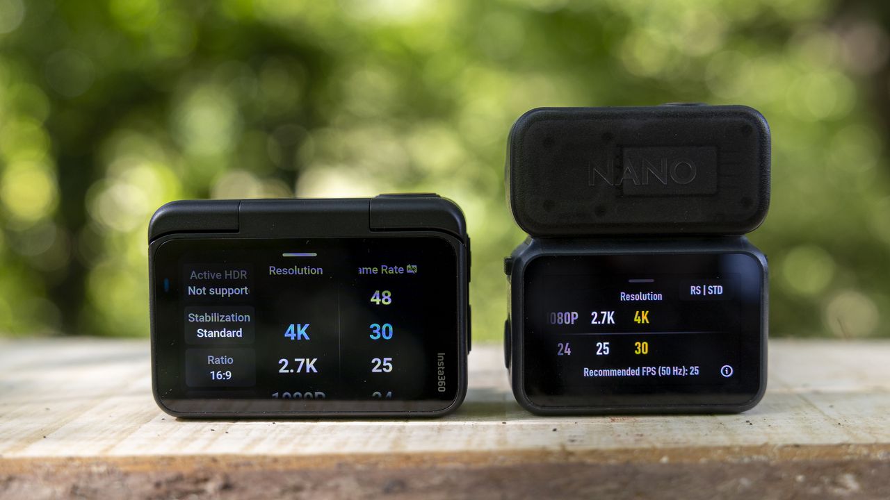 The DJI Osmo Nano and Insta360 Go Ultra next to each other on a bench in a sunny wood