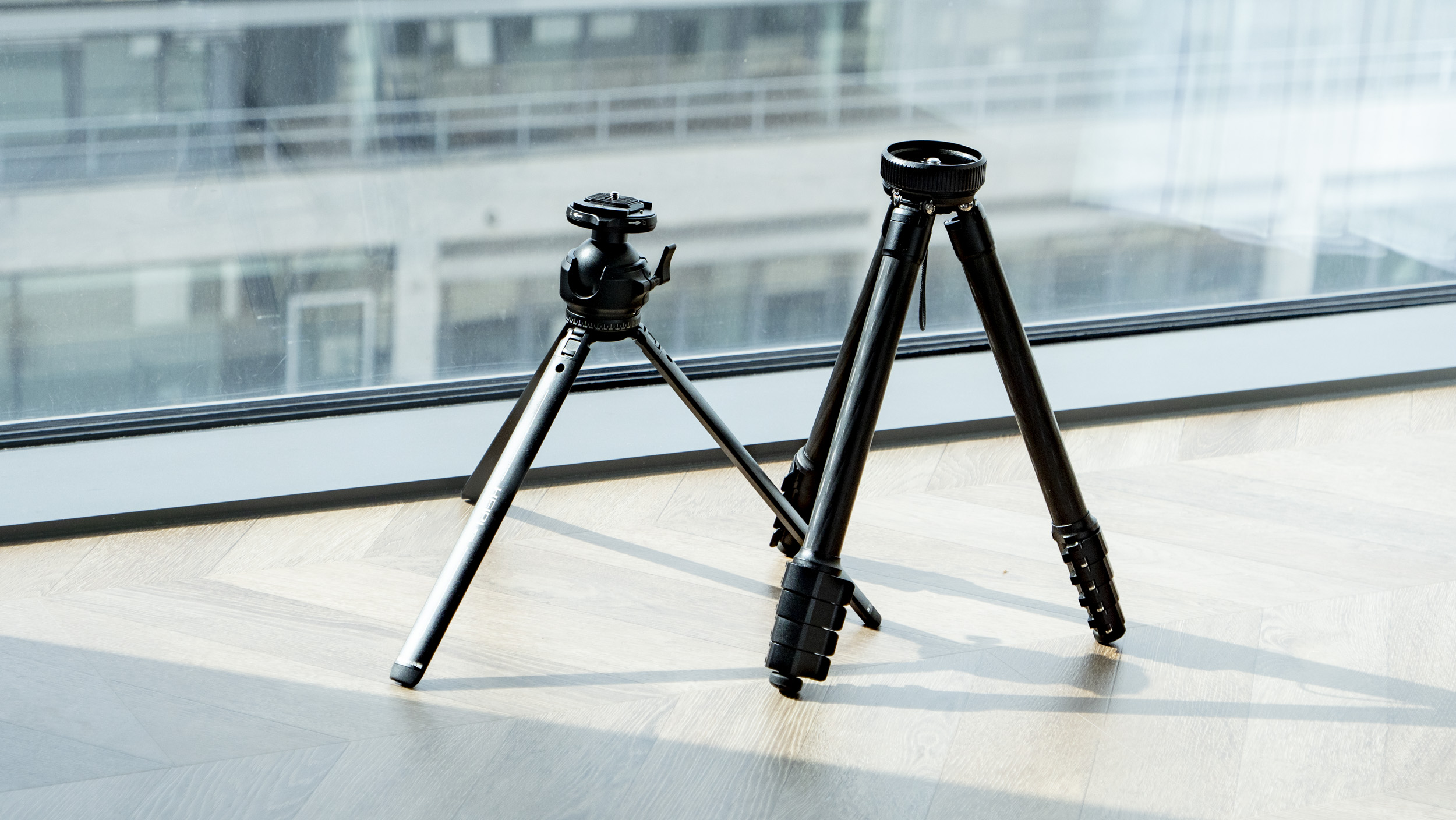 Heipi 3-in-1 Travel Tripod W28S' table tripod and main tripod side by side