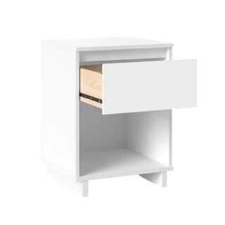A white nightstand with a drawer