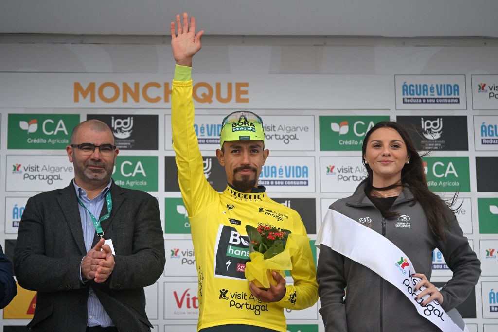 ALTODAFOIA PORTUGAL FEBRUARY 15 Daniel Felipe Martinez of Colombia and Team BORA hansgrohe celebrates at podium as Yellow leader jersey winner during the 50th Volta ao Algarve em Bicicleta 2024 Stage 2 a 1719km stage from Lagoa to Alto da Foia 888m on February 15 2024 in Alto da Foia Portugal Photo by Dario BelingheriGetty Images