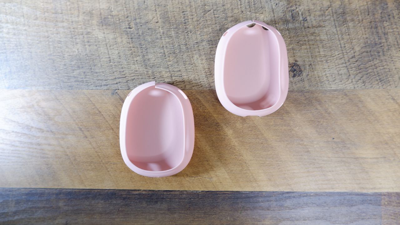 Filoto Silicone Cover for AirPods Max in pink on a wooden background