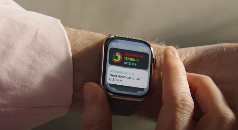 A man using the new widgets in watchOS 10