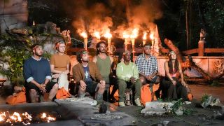 Survivor Episode 2, Season 50 sent Savannah, Ozzy, Cirie, Christian and more to tribal council with Jeff Probst. All their torches are lit and they are sitting by the fire.