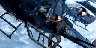 Tom Cruise hanging from a helicopter in Mission: Impossible - Fallout