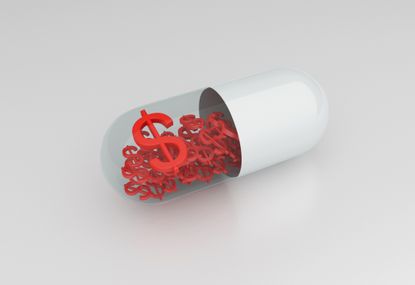 pills with dollar sign isolated on white background