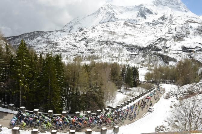 The peloton rode tempo up the first climb