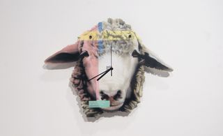 An image of a sheep's head made into a clock