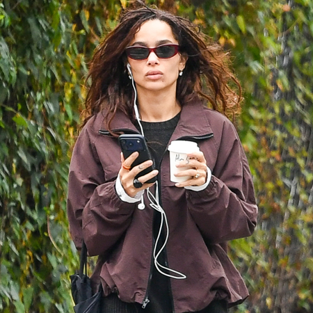 Zoe Kravitz wore a dark brown jacket over black top, black trousers and brown ballet flats. Harry wore a brown jacket with black trousers, burgundy ballet flats and a large Chanel bag.