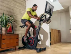 Male rider using the Echelon EX-5s exercise bike