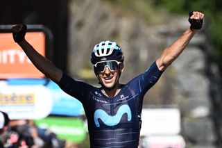 Movistar teams Spanish rider Carlos Verona celebrates as he crosses the finish line at the end of the seventh stage of the 74th edition of the Criterium du Dauphine cycling race 135kms between SaintChaffrey to Vaujany southeastern France on June 11 2022 Photo by Marco BERTORELLO AFP Photo by MARCO BERTORELLOAFP via Getty Images