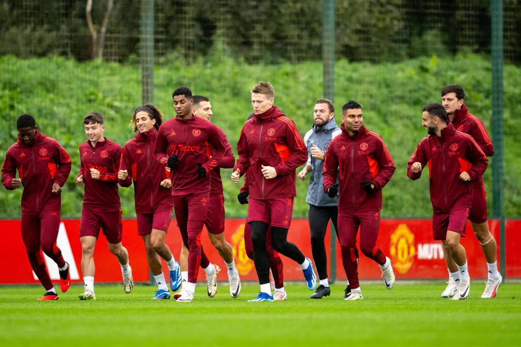 Manchester United stars Harry Maguire, Bruno Fernandes, Casemiro, Scott McTominay, Marcus Rashford, Diogo Dalot, Hannibal Mejbri, Dan Gore and Kobbie Mainoo in action during a first team training session at Carrington Training Ground on October 02, 2023 in Manchester, England.