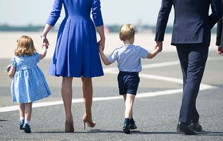 Britain's Prince William (R) his wife Catherine (2-L), Duchess of Cambridge, and their children Prince George (2-R) and Princess Charlotte