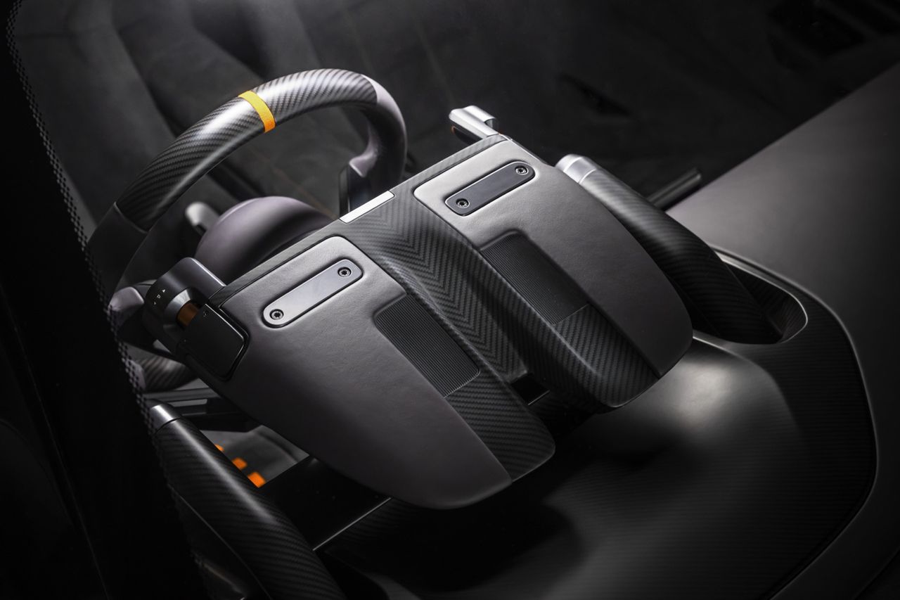 Details of the new McLaren McL6GT, finished in a deep red, looking like a 1970s American racer.