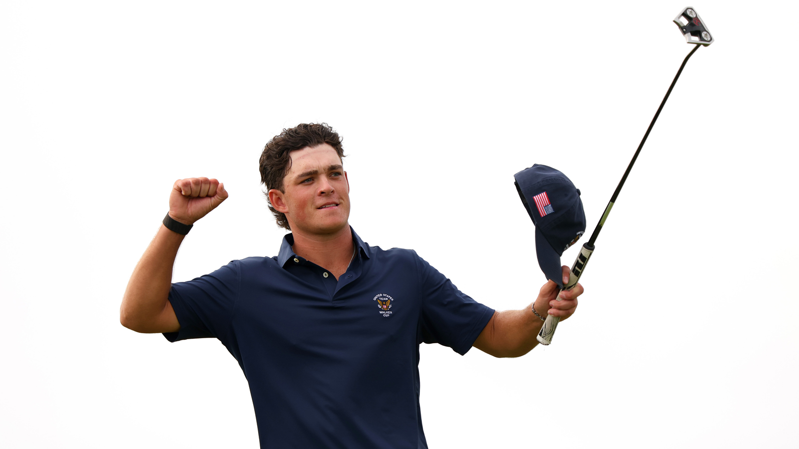Jackson Koivun celebrates a putt