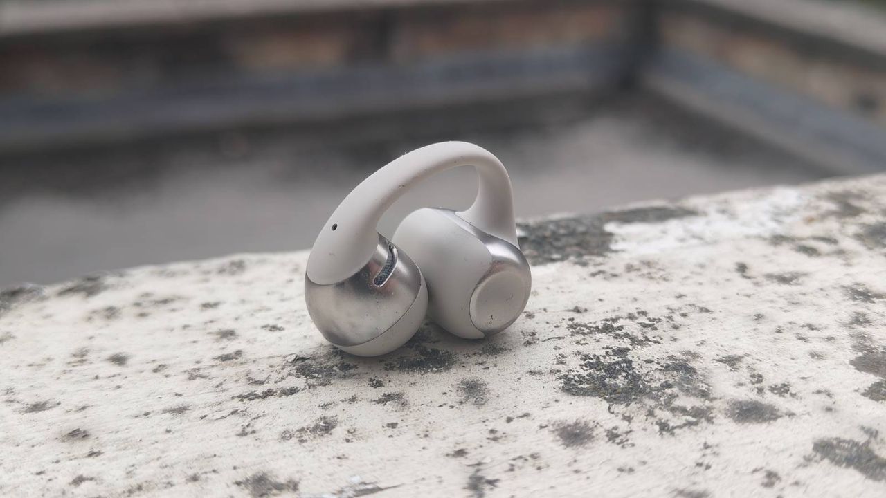 The Shokz OpenDots One on a white windowsill
